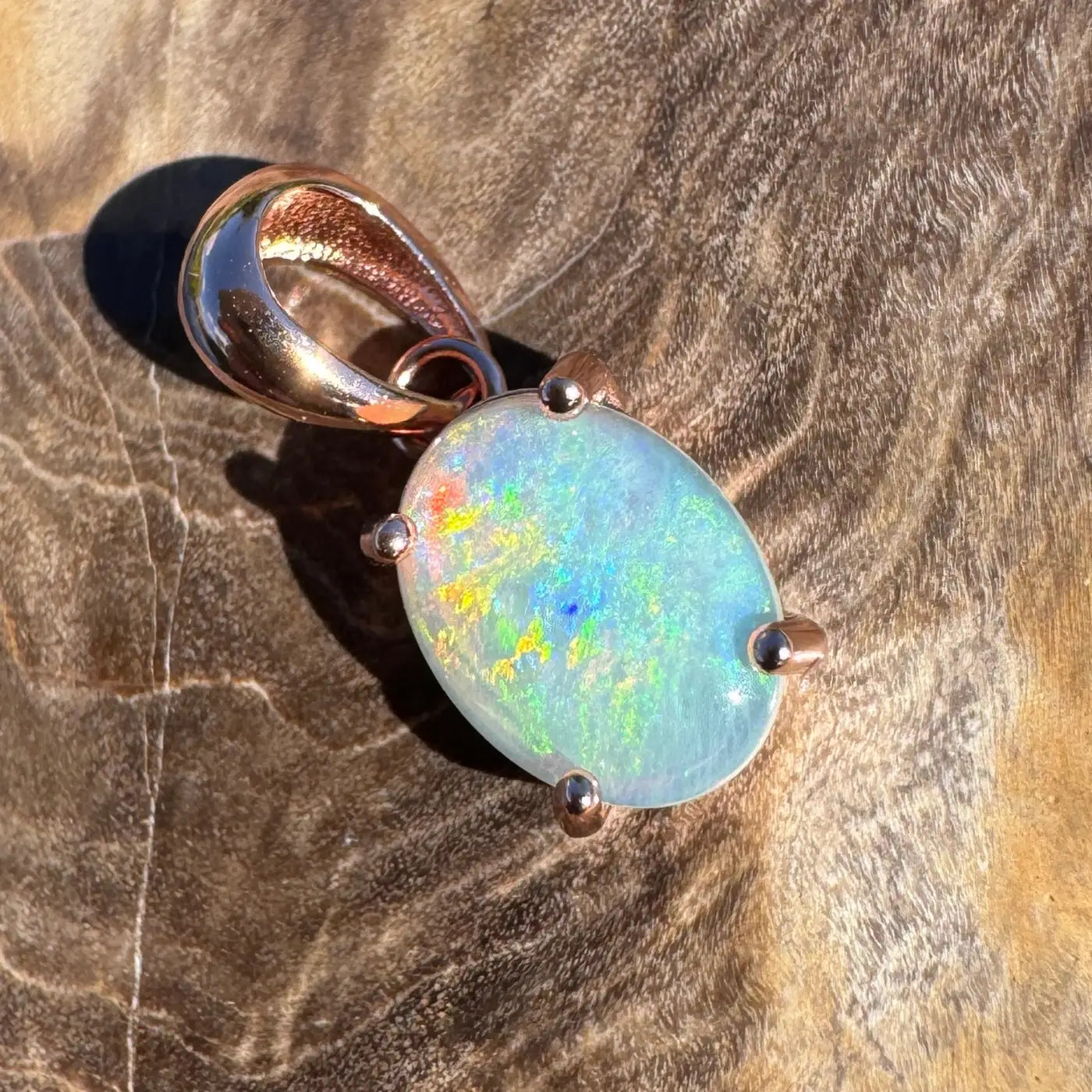 Oval opal pendant with rose gold setting from Great Ocean Drift handcrafted in sterling silver