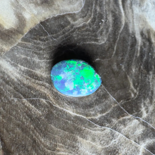 Iridescent blue and green opal.