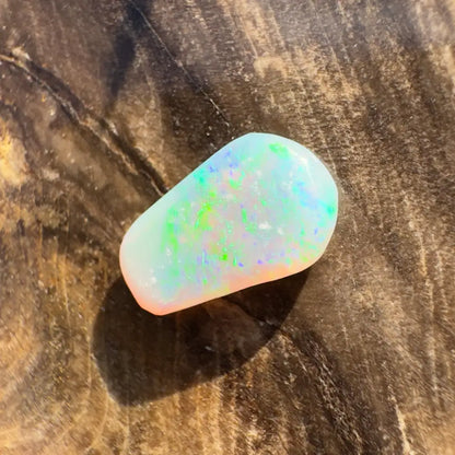 Polished Lightning Ridge Crystal Opal 1.0carat with vibrant color play and intricate pattern