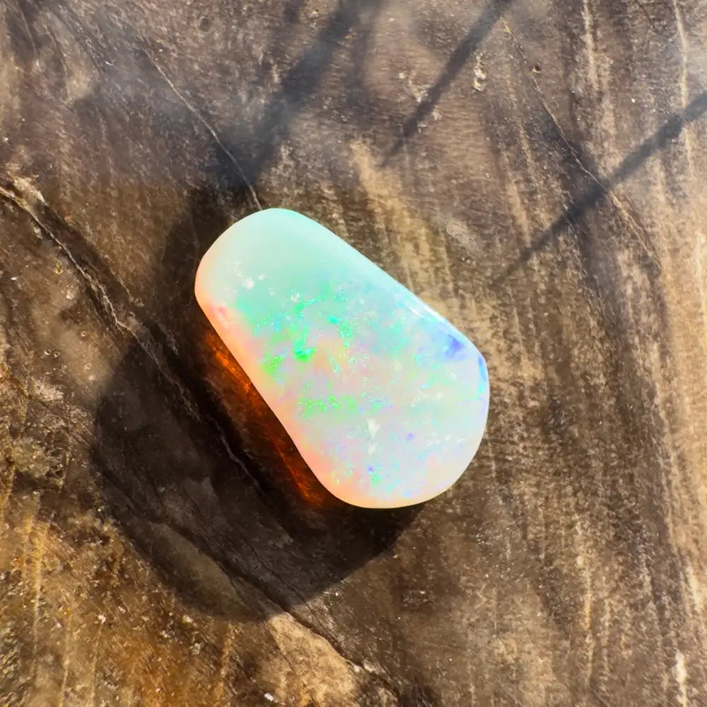 Iridescent opal cabochon from Hand-Cut Solid Lightning Ridge Crystal Opal 1.0 carat