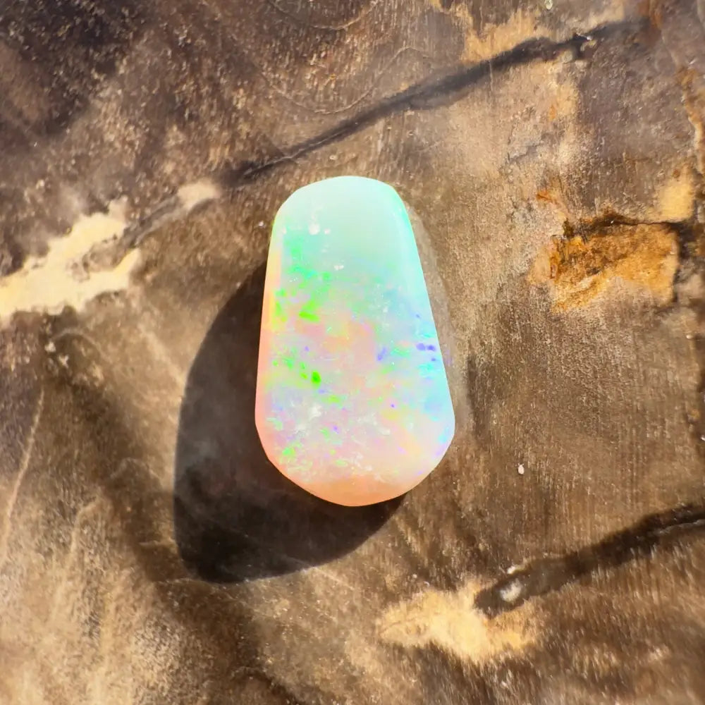 Iridescent Lightning Ridge Crystal Opal gemstone in a hand-crafted 1.0 carat setting