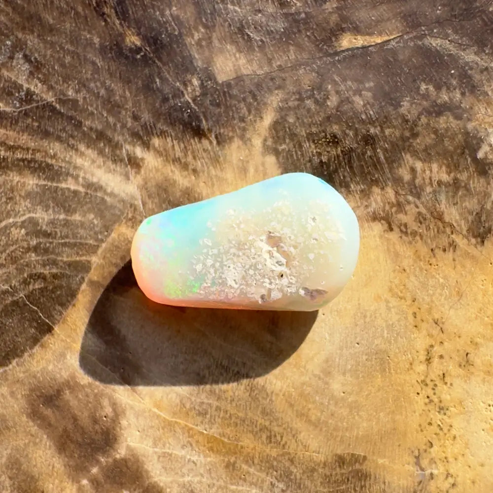 Polished Iridescent Lightning Ridge Crystal Opal 1.0 carat displaying vibrant play of colors