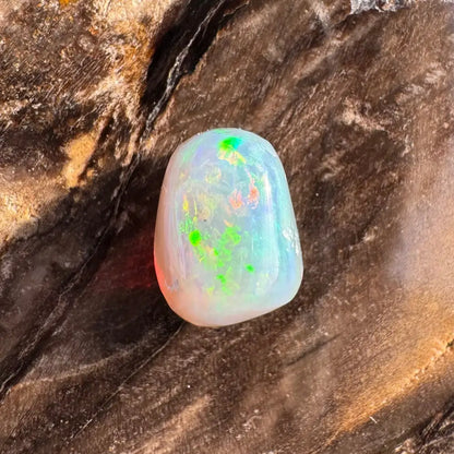 Iridescent Opal gemstone from Lightning Ridge in a hand-cut 2.4carat form