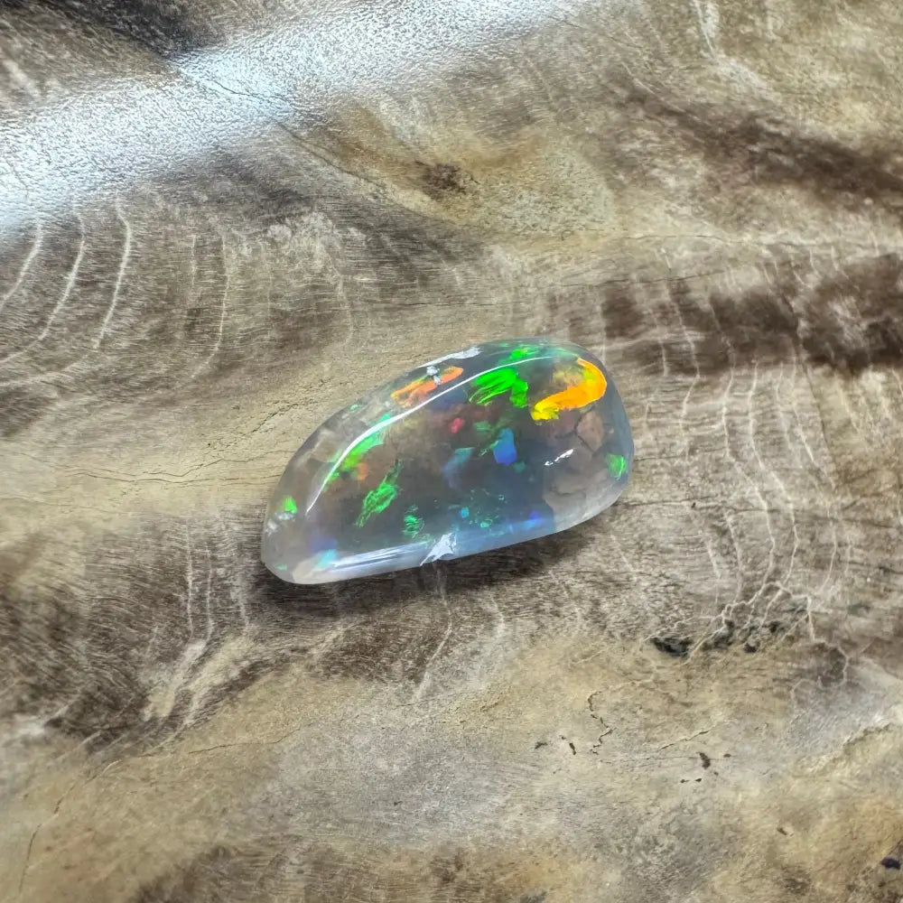 Iridescent opal gemstone from Lightning Ridge in the Hand-Cut Solid Opal 2.6 Carat product