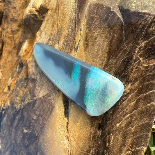 Polished Lightning Ridge semi black opal with blue and green iridescence in 2.9 carats