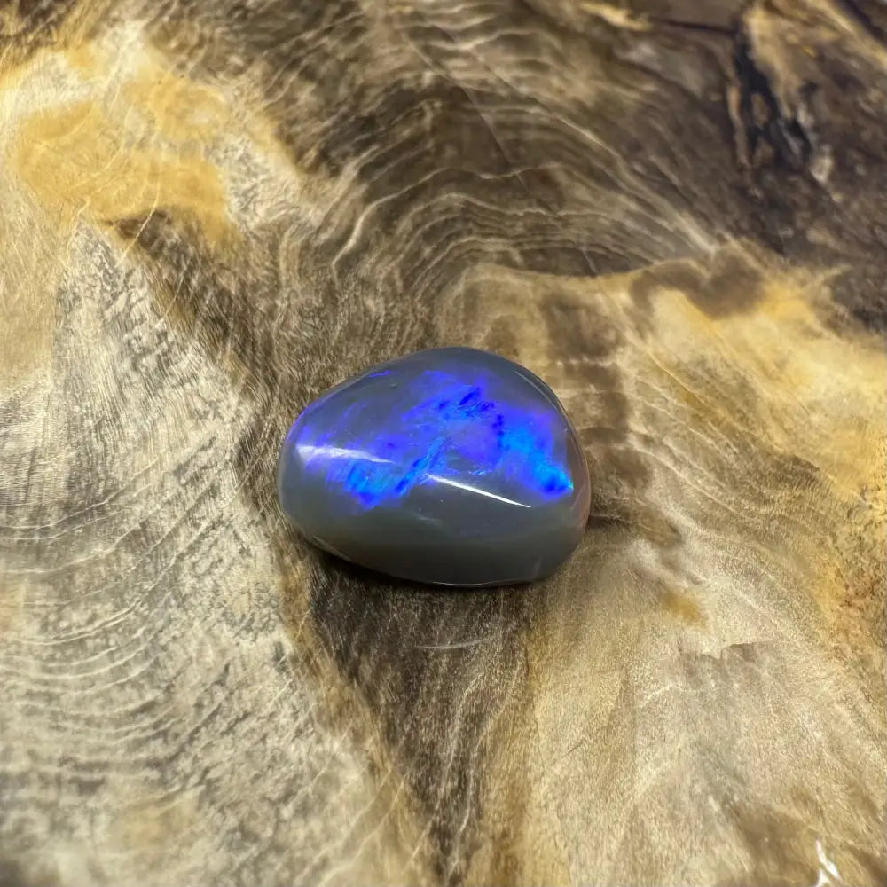 Polished gray opal with blue iridescence from Hand-Cut Solid Lightning Ridge 5.4carat opal