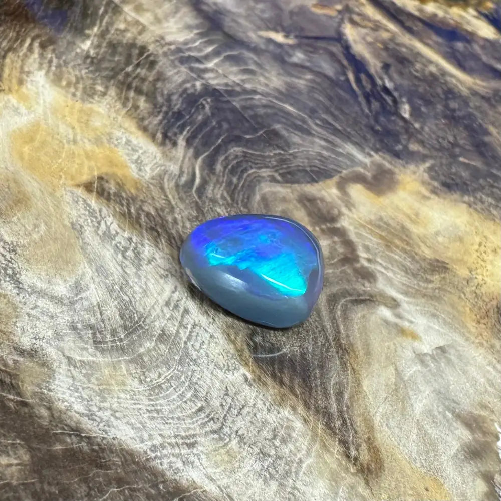 Iridescent blue opal cabochon from Hand-Cut Solid Lightning Ridge Semi Black Opal 5.4 carats