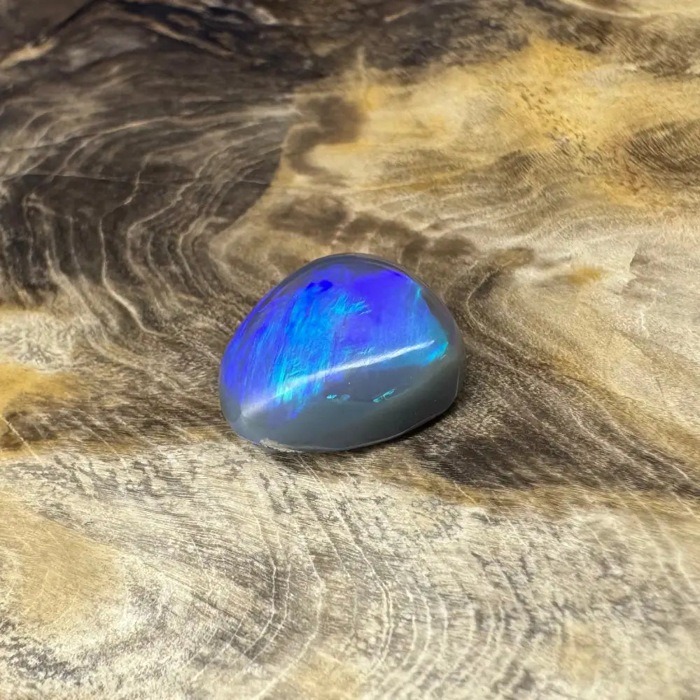Iridescent blue opal cabochon from Hand-Cut Solid Lightning Ridge Semi Black Opal 5.4carat