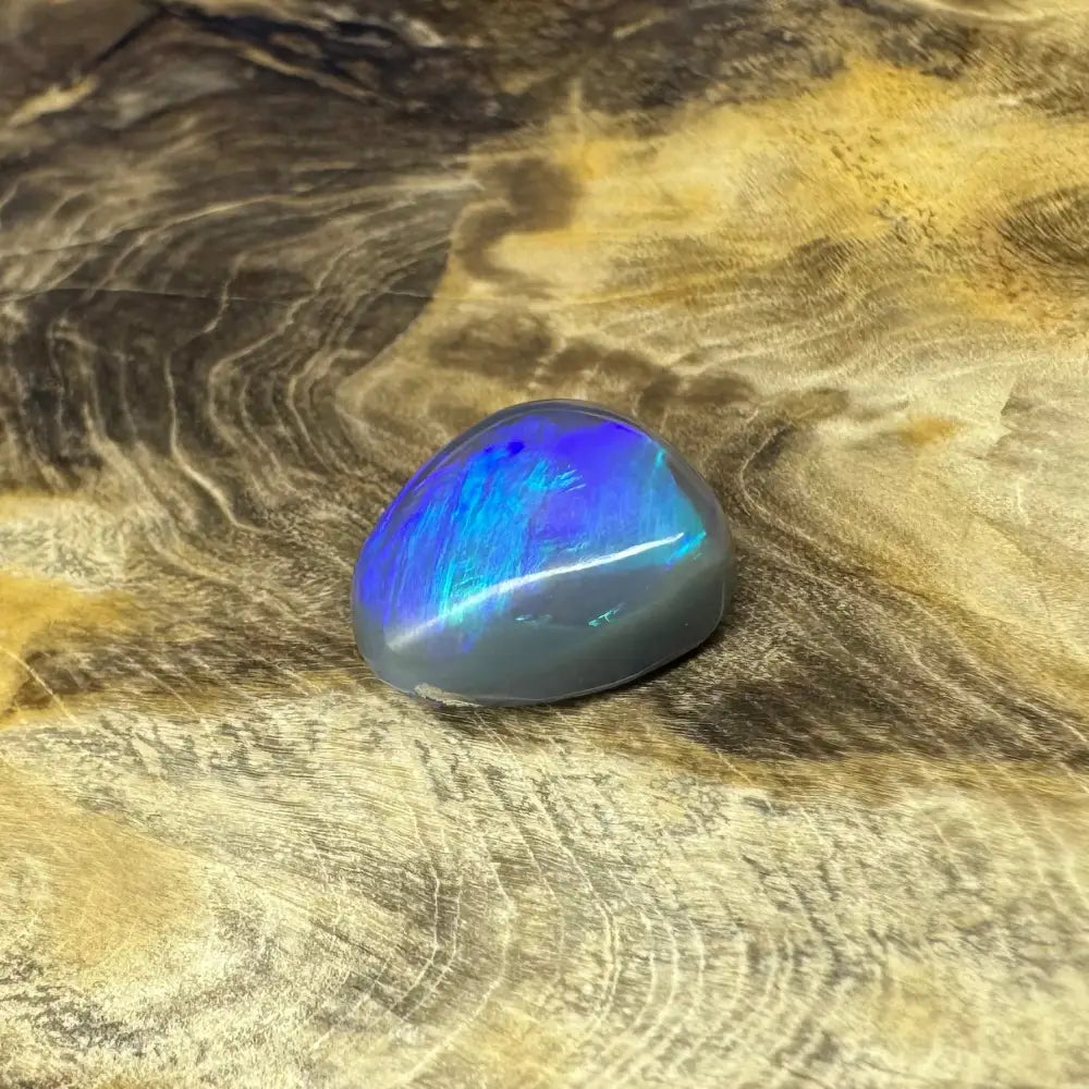Iridescent blue opal cabochon from Hand-Cut Solid Lightning Ridge Semi Black Opal 5.4carat