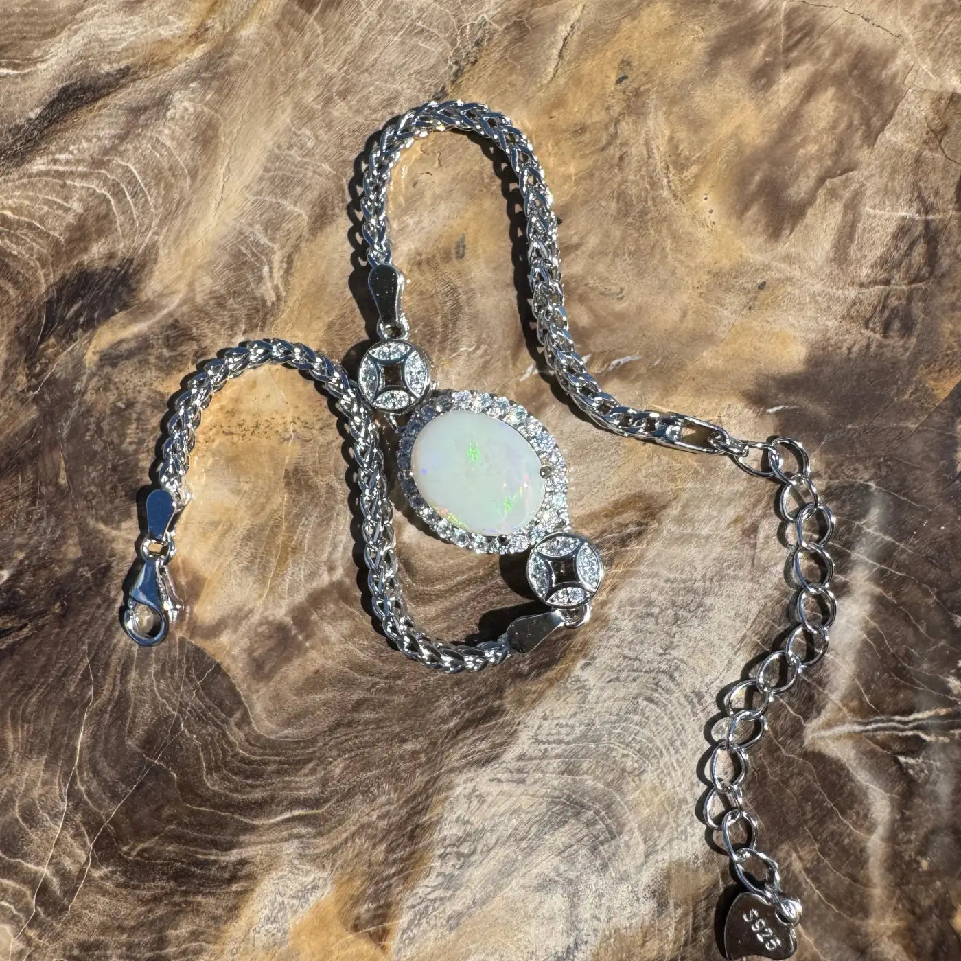 Silver opal necklace featuring a stunning Coober Pedy opal and sterling silver craftsmanship