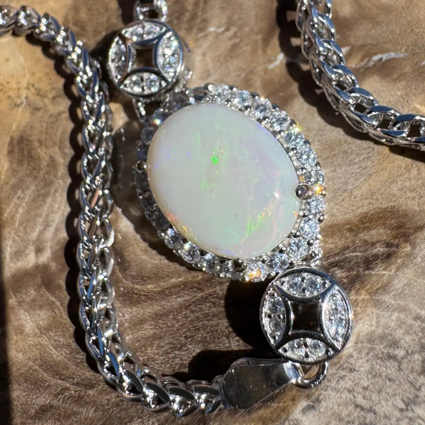 Opal pendant necklace with diamond accents in silver from Handcrafted Coober Pedy collection