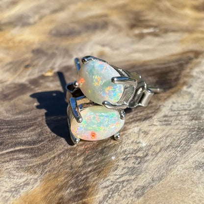 Opal stud earrings with silver prongs from Kimberley Blaze handcrafted Lightning Ridge opal jewelry