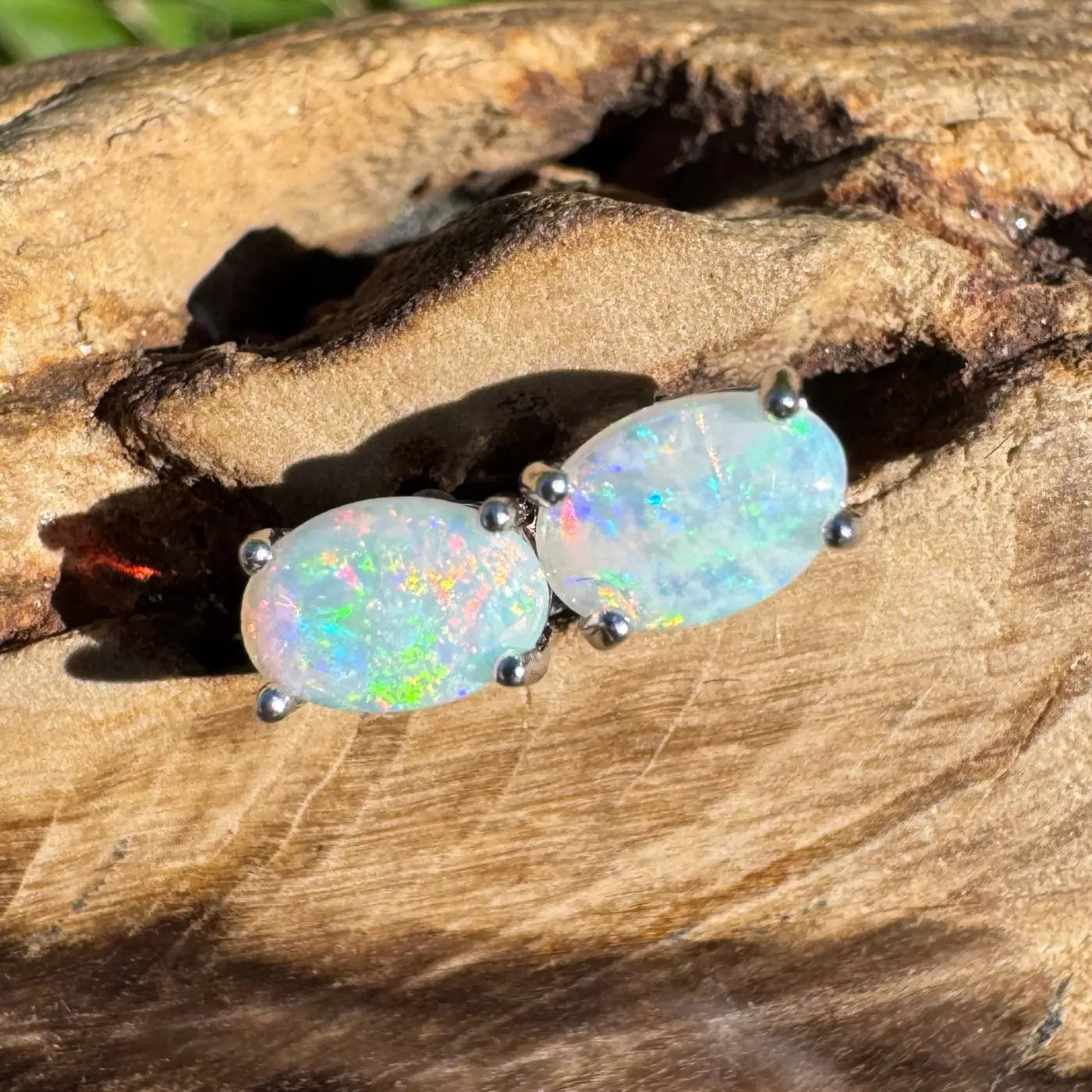 Handcrafted Kimberley Blaze Lightning Ridge Opal stud earrings showcasing 1-carat solid gemstone