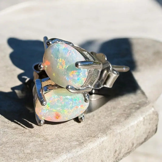 Handcrafted Kimberley Blaze Lightning Ridge Opal stud earrings with silver prongs