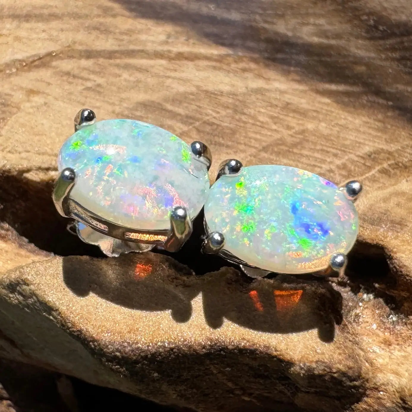 Pair of oval opal stud earrings from Kimberley Blaze featuring 1ct solid Lightning Ridge Opals