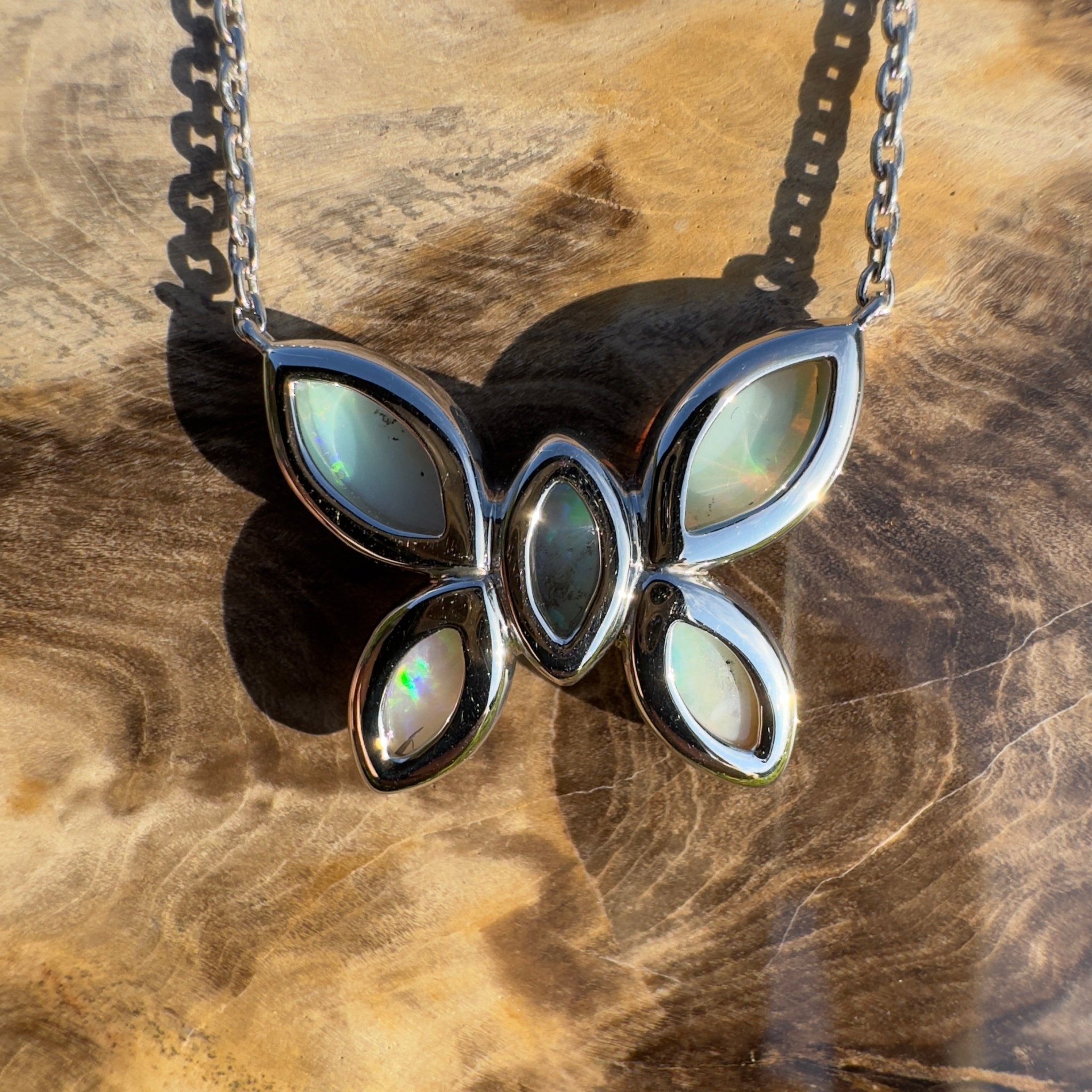 Kimberley Sun Crest – 2.2ct Coober Pedy Opal Butterfly Pendant