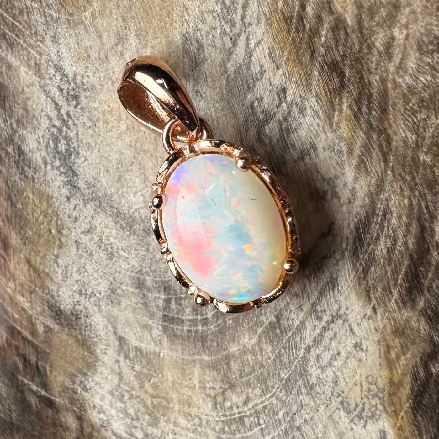 Rose gold opal pendant from Larapinta Flame handcrafted 0.8ct Coober Pedy Opal