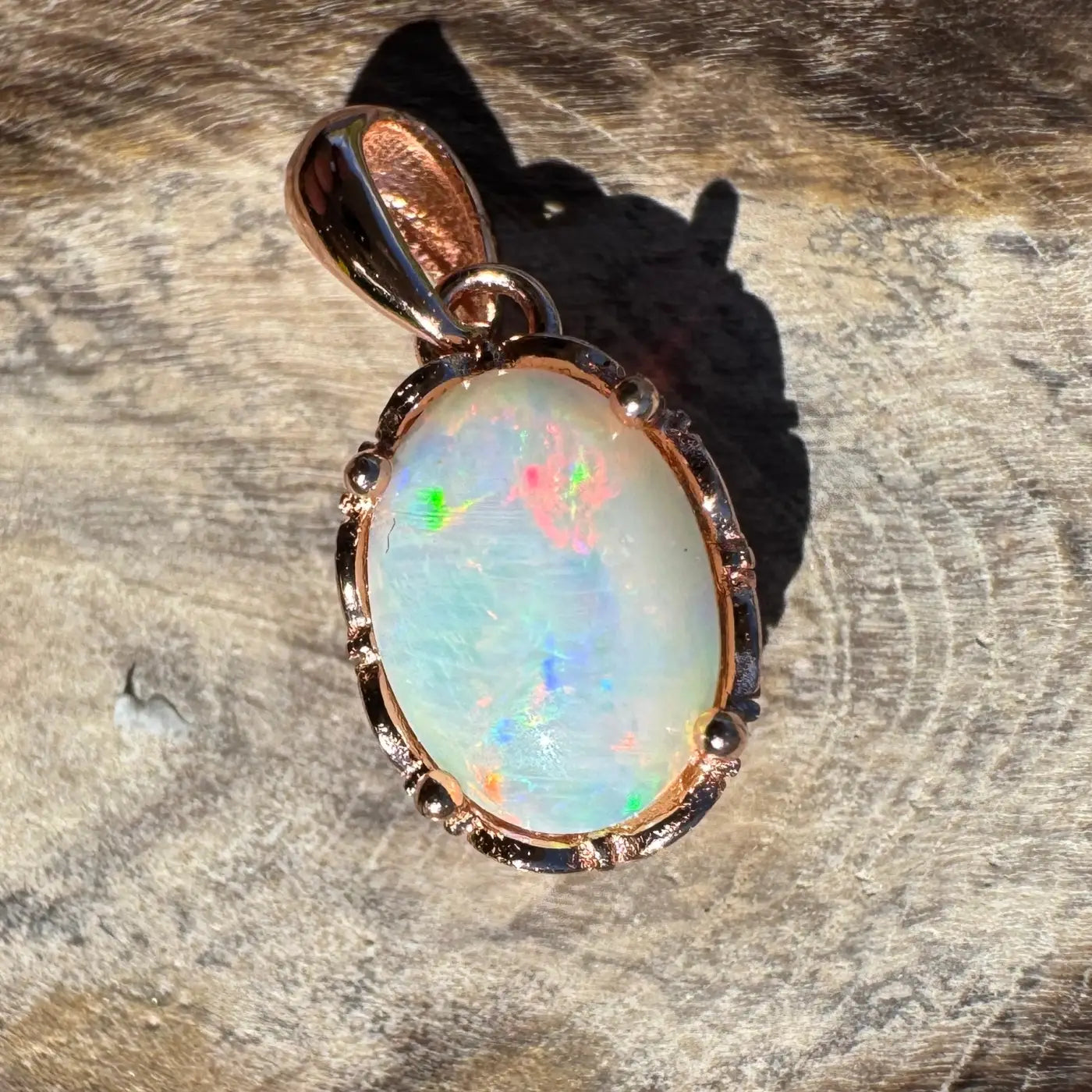 Rose gold opal pendant from Larapinta Flame handcrafted 0.8ct Coober Pedy opal in sterling silver