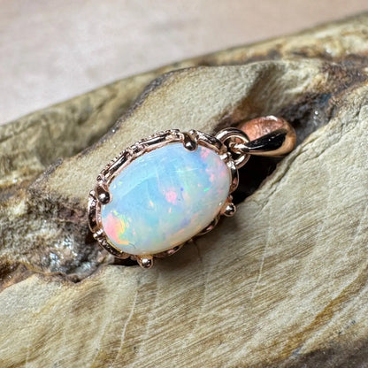 Oval opal pendant with rose gold setting in the Larapinta Flame handcrafted necklace
