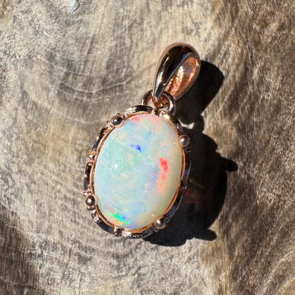 Rose gold opal pendant from Larapinta Flame handcrafted 0.8ct Coober Pedy opal