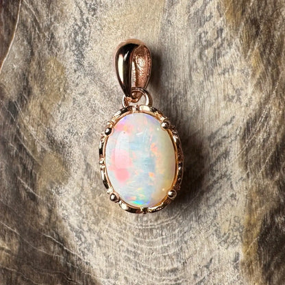 Rose gold opal pendant from Larapinta Flame showcasing handcrafted 0.8ct Coober Pedy opal