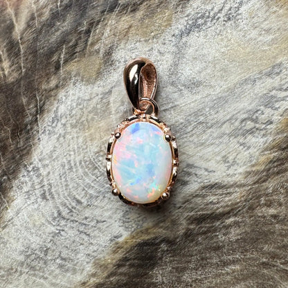 Rose gold opal pendant in handcrafted Coober Pedy 0.8ct solid opal and sterling silver