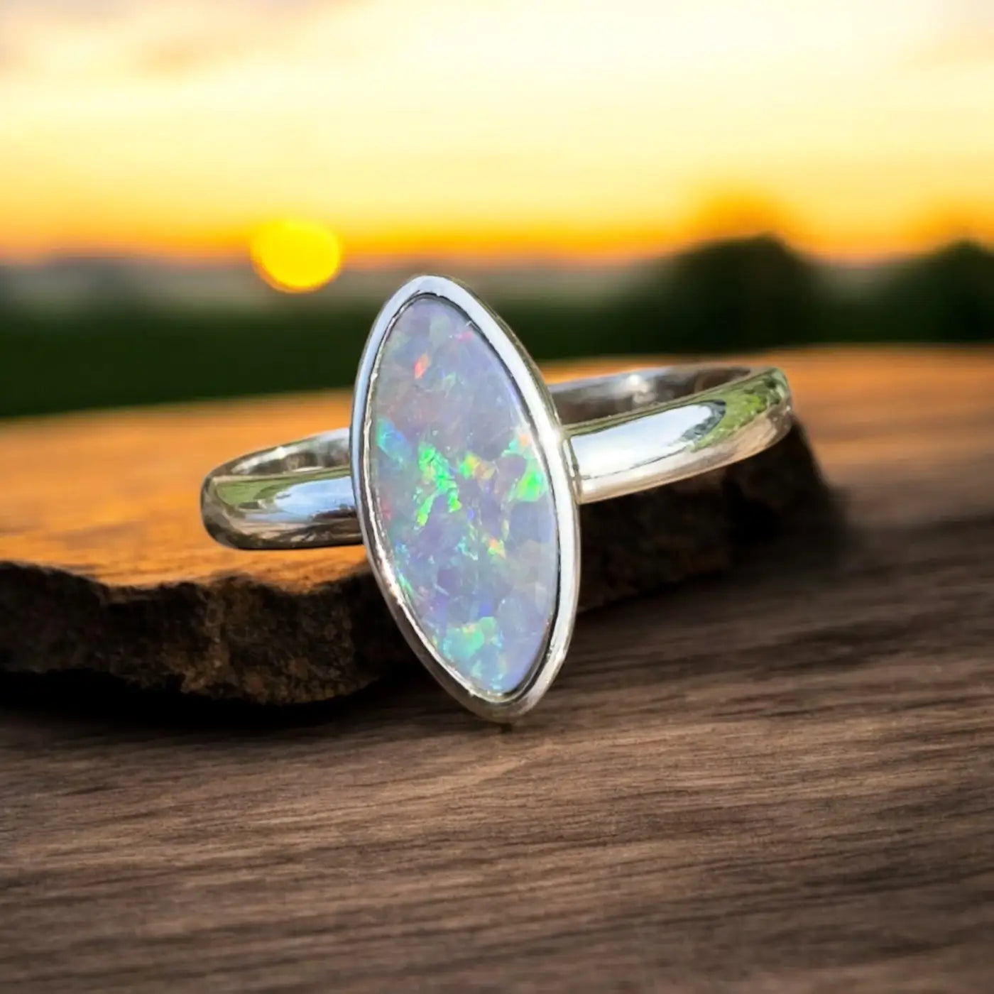 Silver ring featuring an iridescent Lightning Ridge Opal in a handcrafted 925 Sterling Silver setting