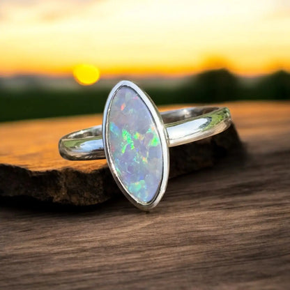 Silver ring featuring an iridescent Lightning Ridge Opal in a handcrafted 925 Sterling Silver setting