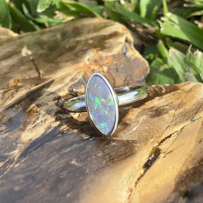Silver ring featuring an oval Lightning Ridge Opal from the Lightning Loop collection