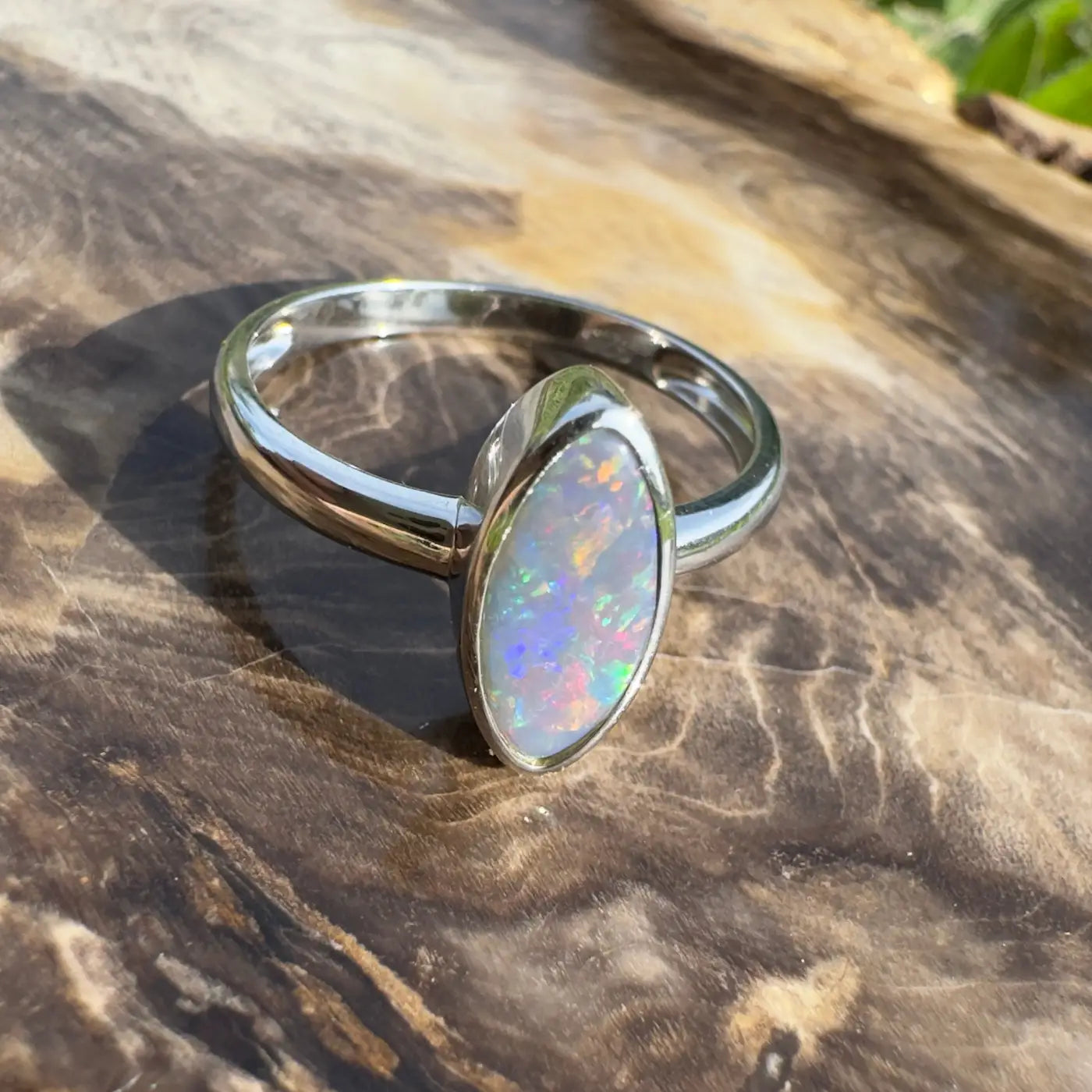 Silver ring featuring an iridescent Lightning Ridge Opal in a handcrafted Sterling Silver setting