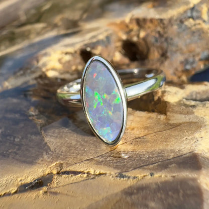 Silver ring featuring an iridescent Lightning Ridge opal in a handcrafted 925 sterling silver setting