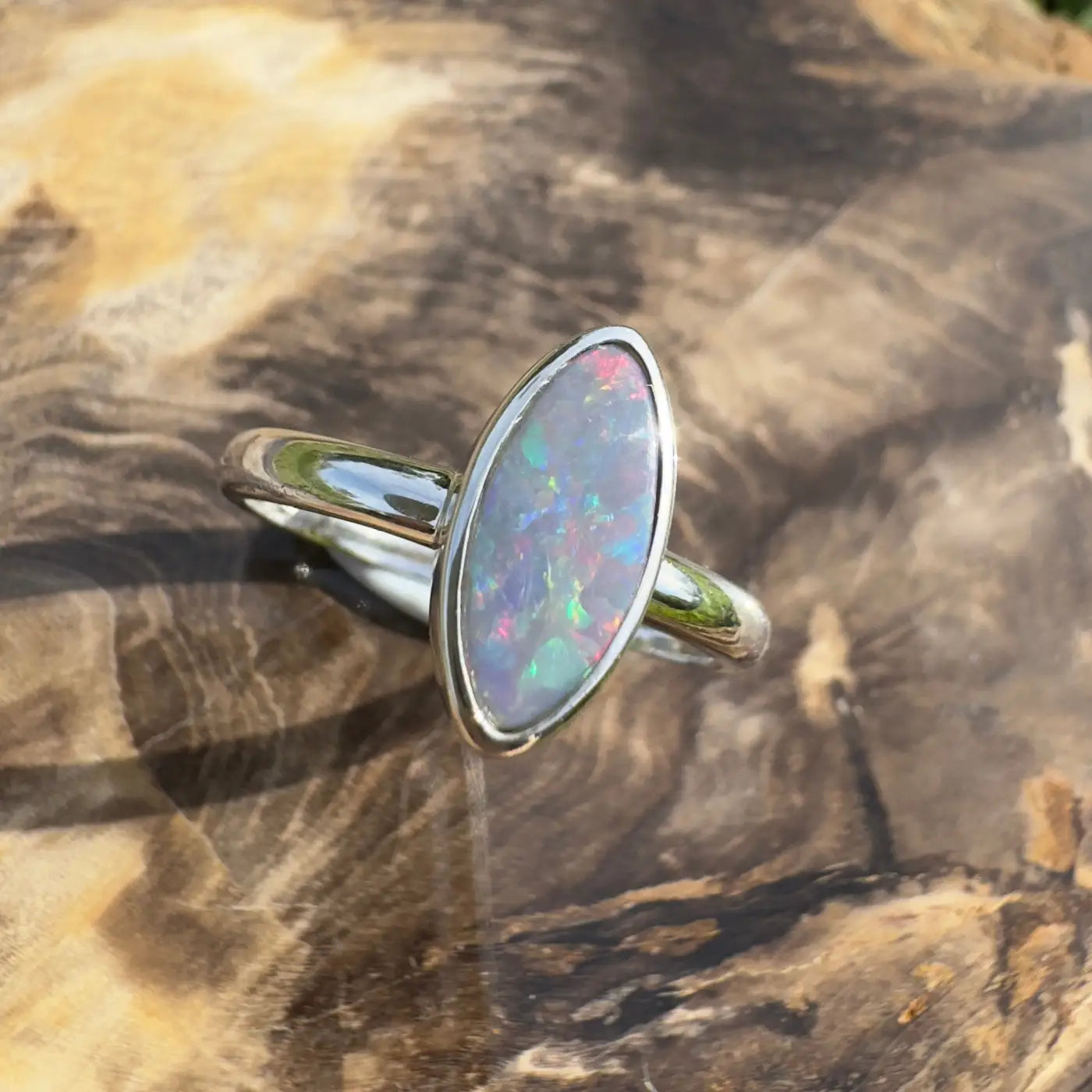 Silver ring with iridescent Lightning Ridge opal handcrafted in 925 sterling silver