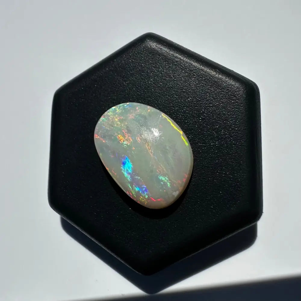 Iridescent oval opal gemstone from Lightning Ridge, 2.4 carat solid hand-cut jewelry piece