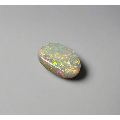 Oval Lightning Ridge Opal 2.4 carat solid hand-cut gemstone with iridescent play-of-color