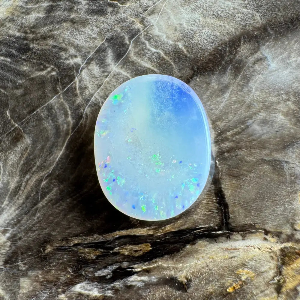 Oval opal gemstone with blue and green play-of-color in Lightning Ridge Opal 3.5carat solid hand-cut
