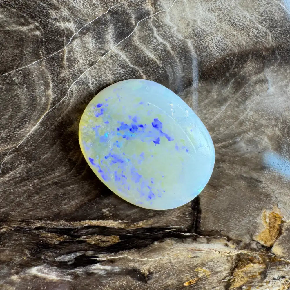 Iridescent opal cabochon in the Lightning Ridge Opal 3.5 carat solid hand-cut jewelry piece