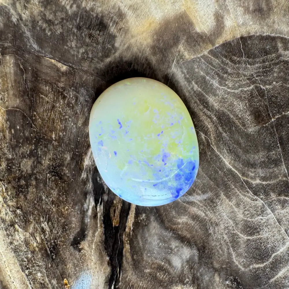 Polished light green and blue Lightning Ridge Opal 3.5 carat solid hand-cut gemstone