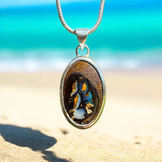 Oval opal pendant necklace from Natural Wonders featuring handcrafted 8.8ct Queensland Boulder Opal in 925 Sterling Silver
