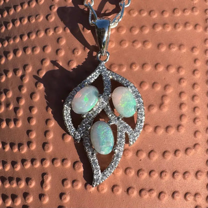 Leaf-shaped opal and diamond pendant with 1.2ct Lightning Ridge Opal in sterling silver