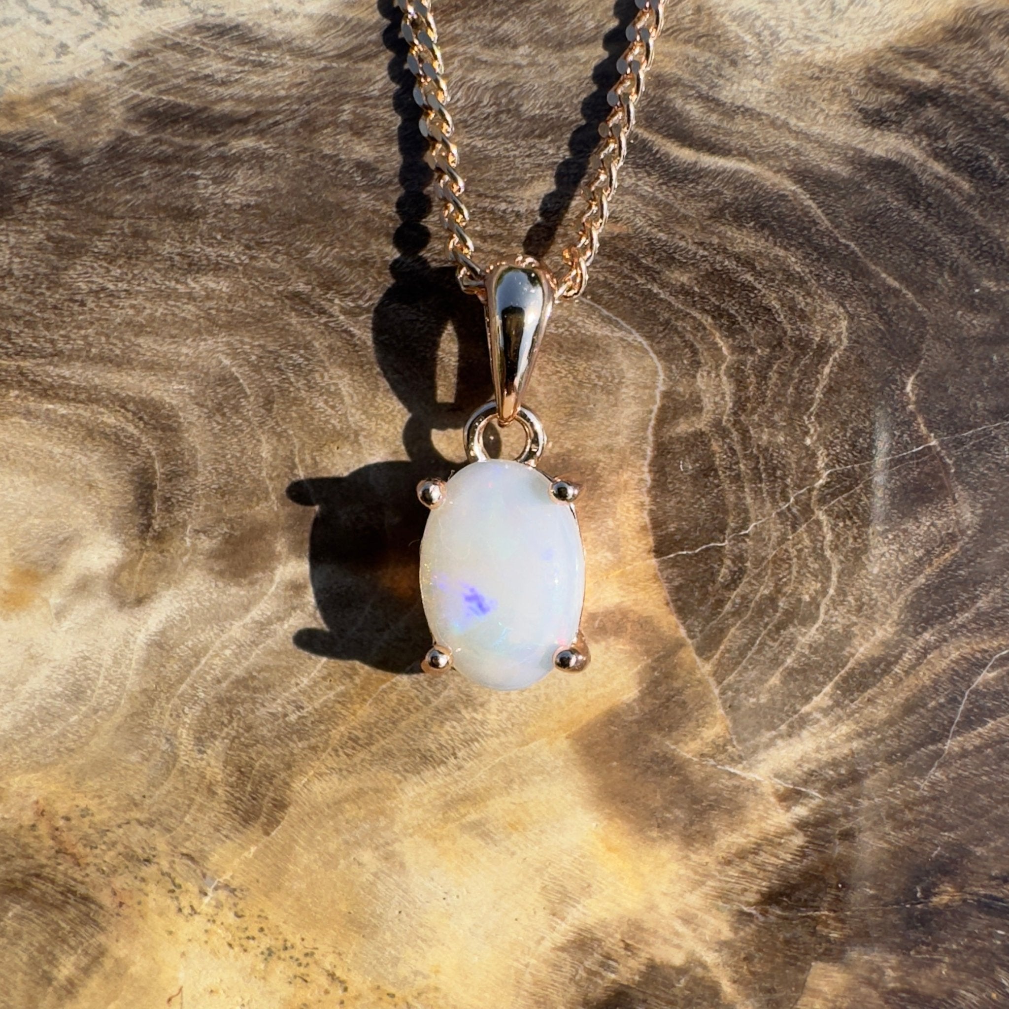 Nullarbor Grace - 0.6ct Coober Pedy Opal Rose Gold Coated 925 Silver Pendant