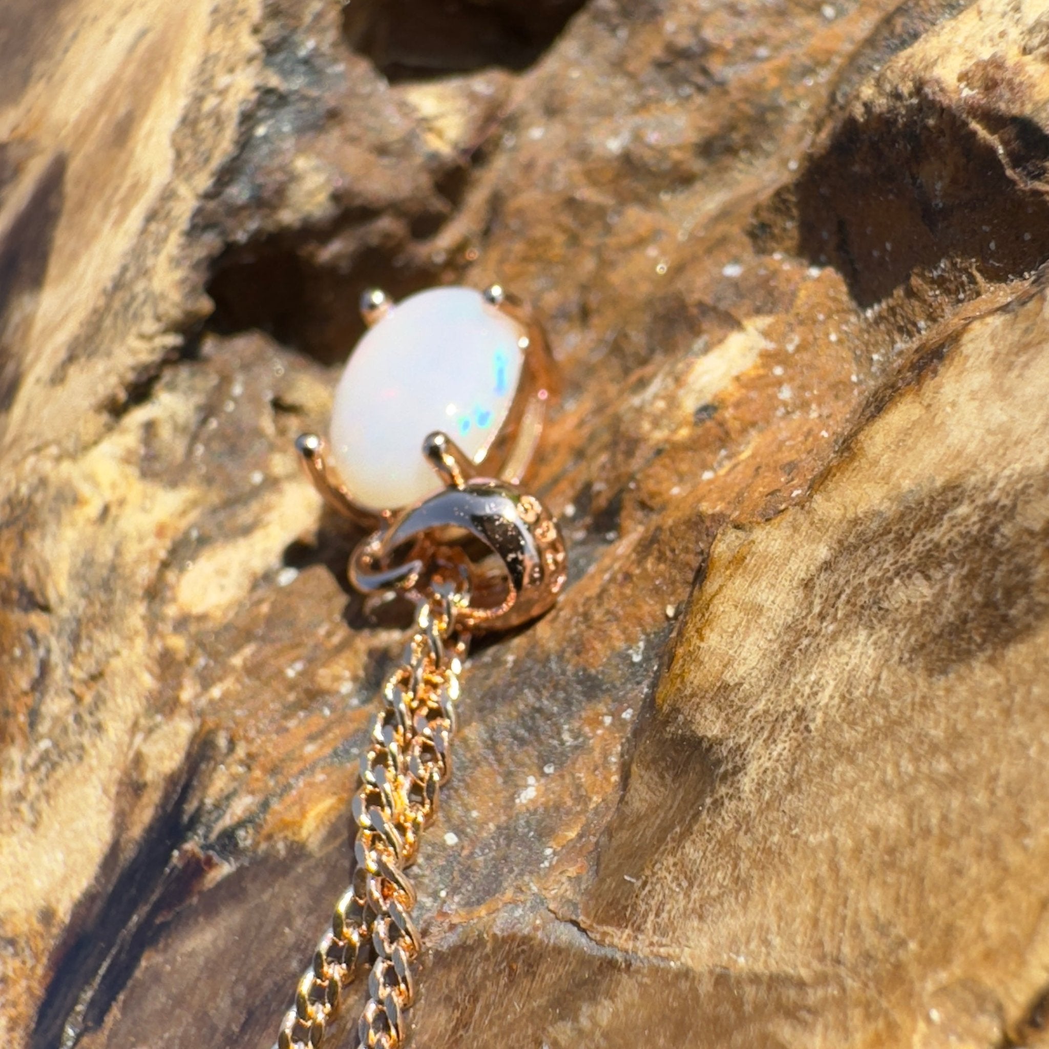 Nullarbor Grace - 0.6ct Coober Pedy Opal Rose Gold Coated 925 Silver Pendant