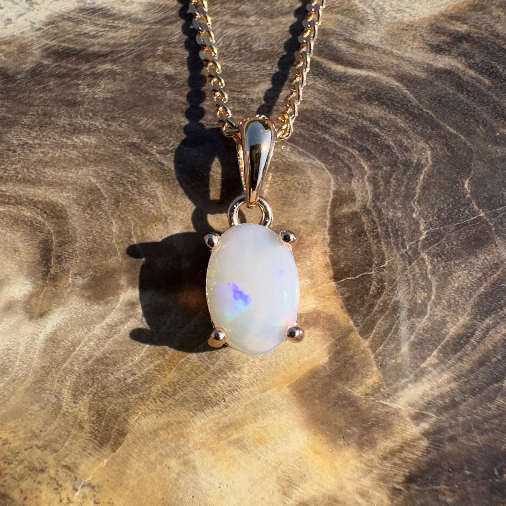 Nullarbor Grace - 0.6ct Coober Pedy Opal Rose Gold Coated 925 Silver Pendant