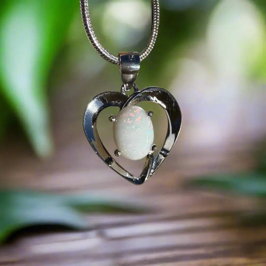 Heart-shaped opal pendant necklace from Opal Love featuring handcrafted solid Coober Pedy opal and sterling silver