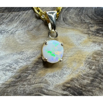 Opal pendant with gold chain from Outback Dreams featuring a handcrafted 9ct solid gold Coober Pedy opal