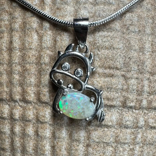 Silver cow pendant with 0.4ct Lightning Ridge Opal and cubic zirconia in sterling silver