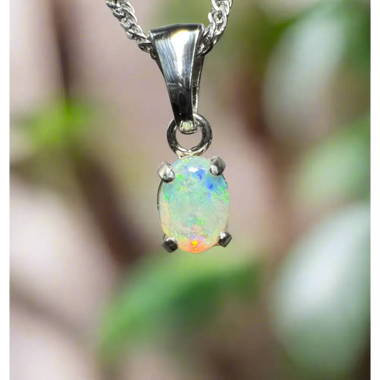 Opal pendant necklace featuring a handcrafted 0.6ct Coober Pedy Opal in sterling silver