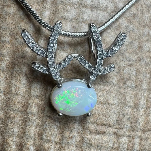 Opal pendant with antler-shaped accents from Rainbow Reindeer handcrafted sterling silver necklace