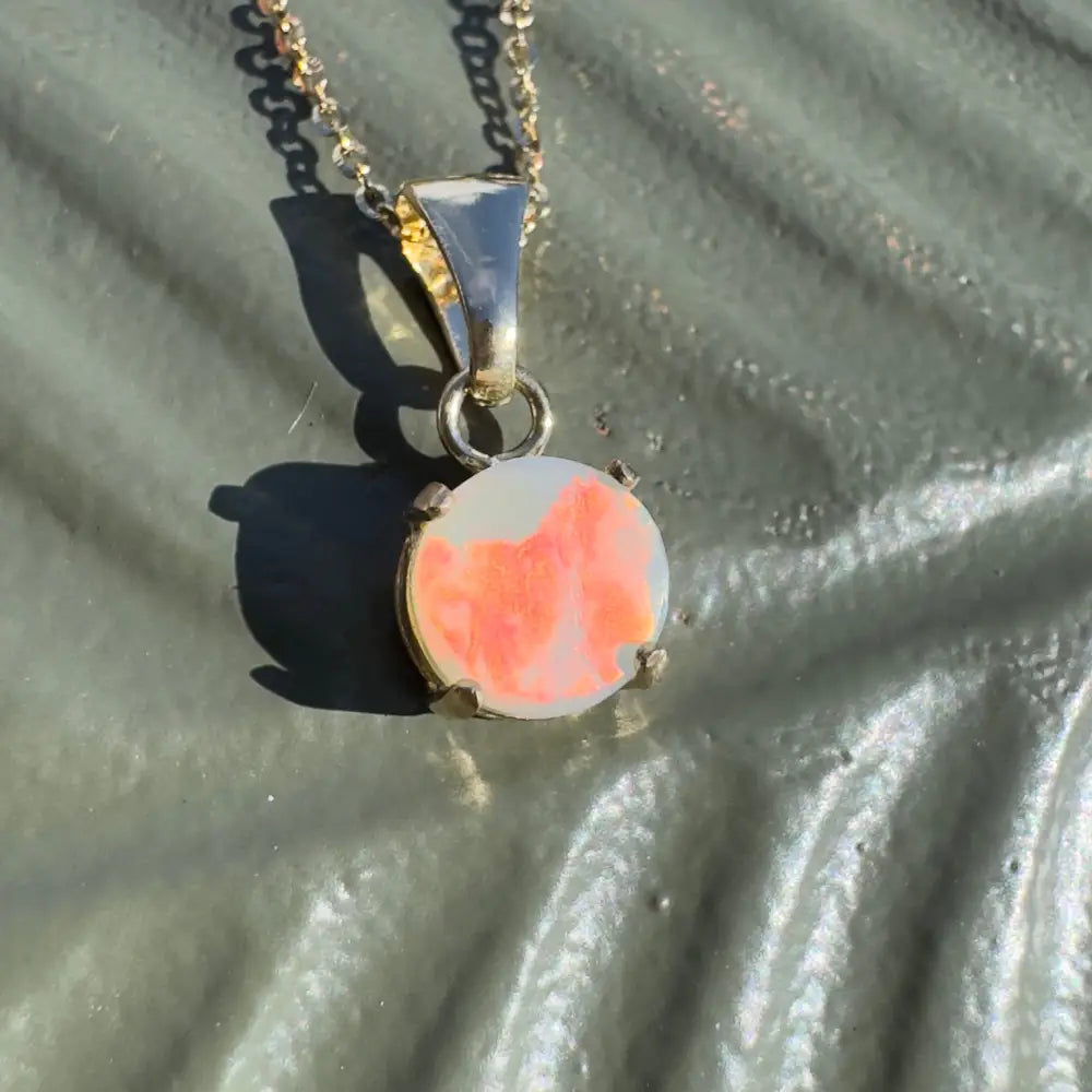 Silver necklace with a stunning Lightning Ridge opal pendant from Red Sky at Night collection