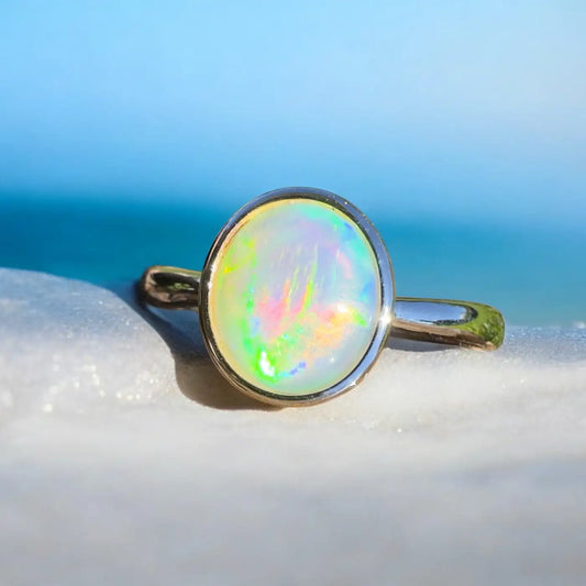Opal gemstone ring featuring a 1.2 carat Lightning Ridge Crystal Opal in sterling silver