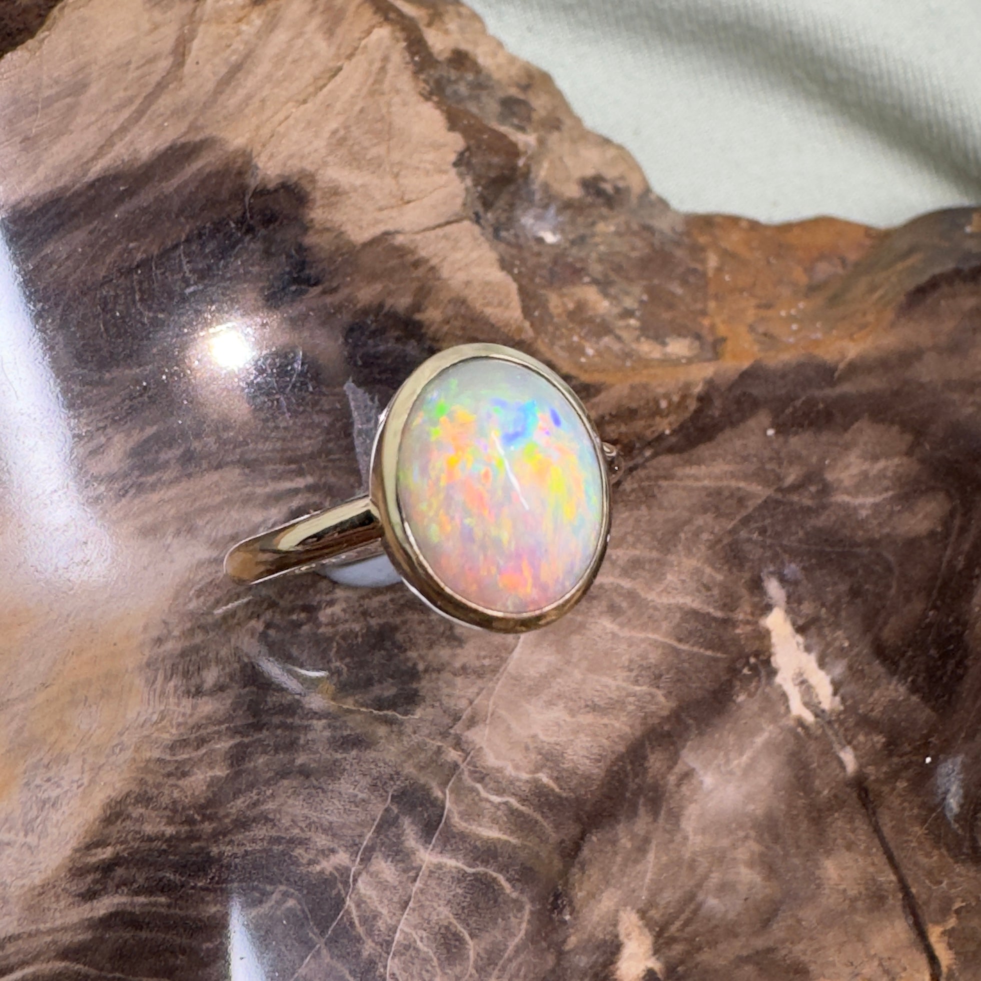 Simpson Halo ~ 3.3ct Solid Lightning Ridge Opal 9ct Yellow Gold Ring